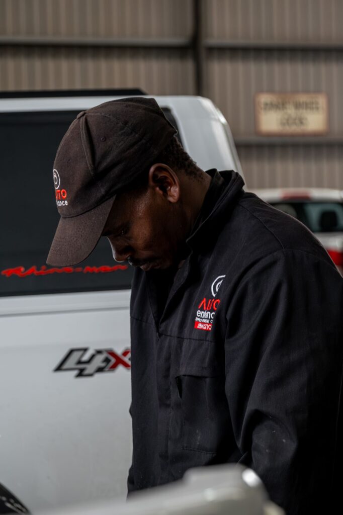 Auto Enhance fitment technician preparing an accessory